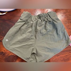 Green Lululemon shorts (6 Tall)